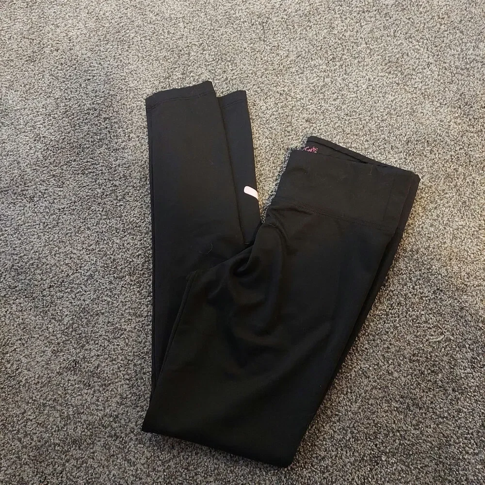 Justice black stretchy leggings Medium XL (16/18) Spell out
